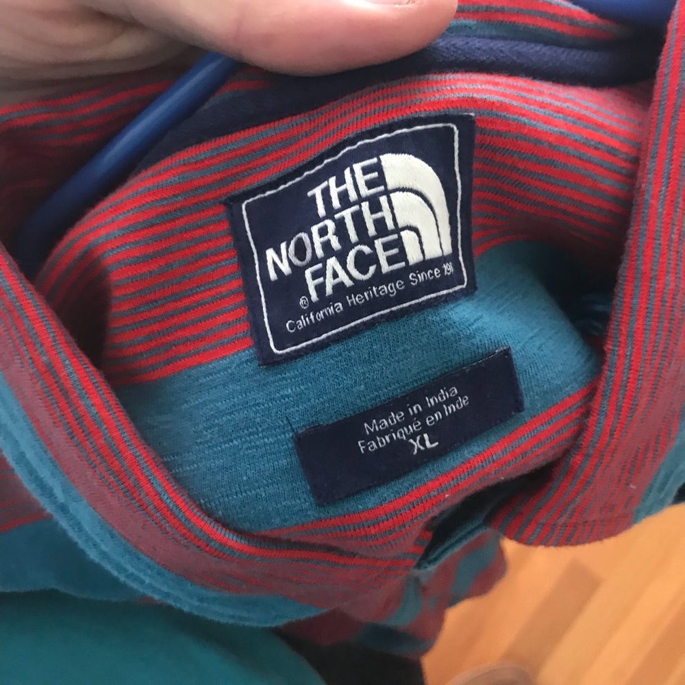 The North Face red and blue collared shirt